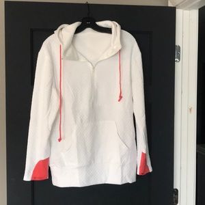 White textured hoodie with pink detail
